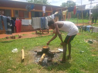 AAU Students Spotted While Cooking With Firewood In The Hostel