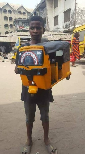 Nigerian Boy Constructs A Keke-napep