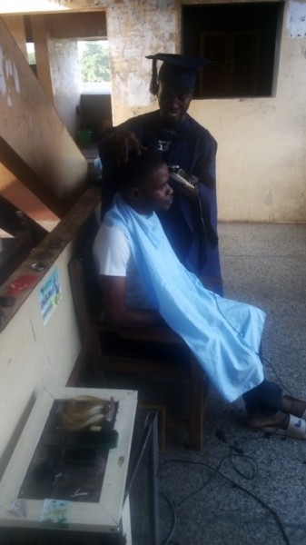 See The Most Popular Barber In Oau Barbing In His Convocation Gown