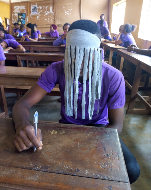 Anambra student who showed up for exams dressed as Anas Aremeyaw Ghanaian masked journalist chased out of class photos