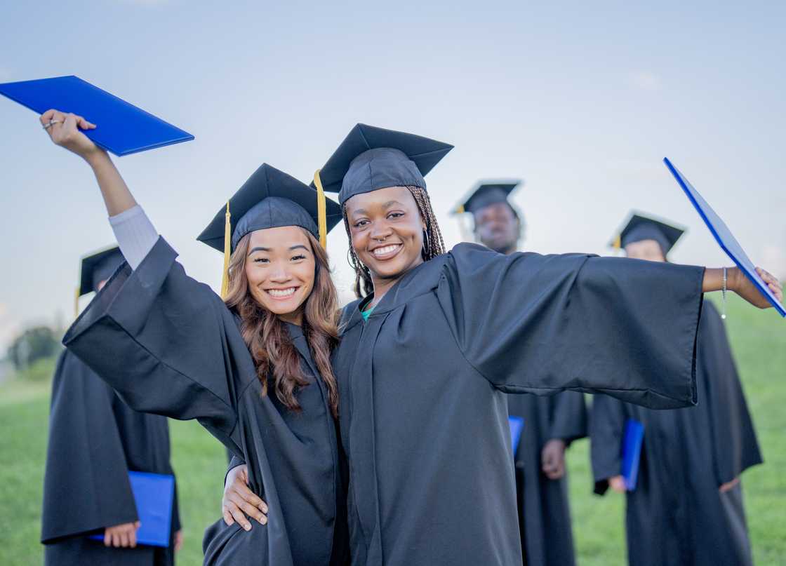 Students celebrating their graduation moment