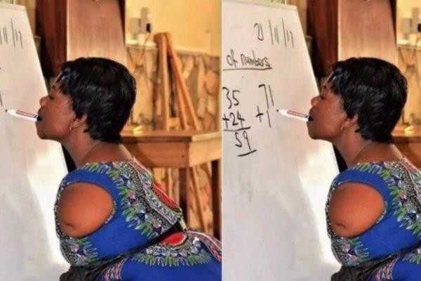 Photo of Armless Mathematics Teacher Writing With Her Teeth