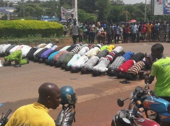 OAU Students Shut School Over Fees Hike, Pray on Highway