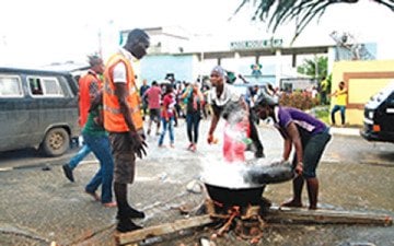 Students of Lagos State University protesting tuition hike at the Governors Office Alausa in Ikeja on Thursday