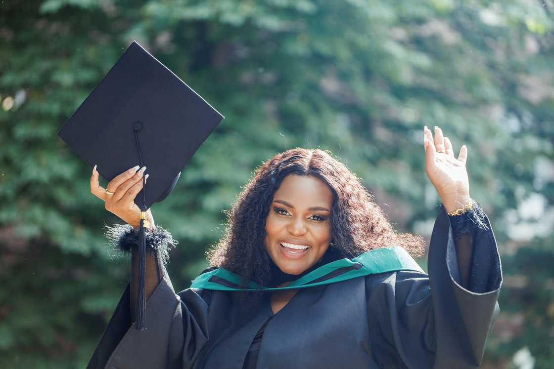 A lady rejoices on her graduation