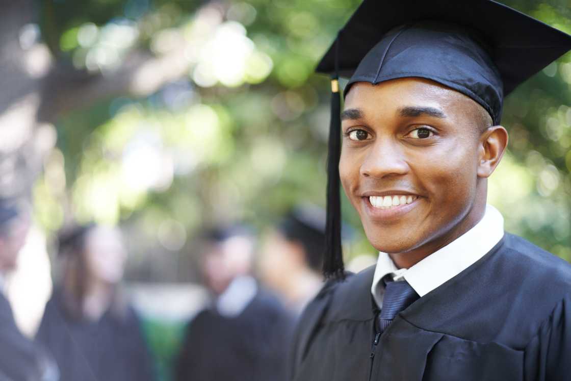 A smiling student on graduation