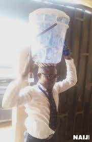 Viral Photo of a Man Selling Sachet Water in Corporate Attire.