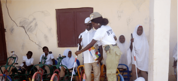 Corps Member Donates Wheelchairs, Hearing Aids and Clutches as CDS Project